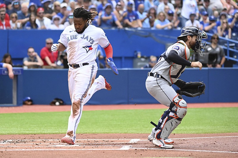 Guerrero Jr. reaches base three times in Triple-A debut 