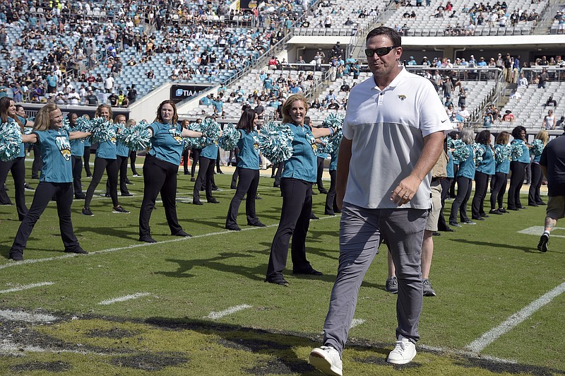 FILE - Former Jacksonville Jaguars player Tony Boselli is honored on the field during halftime of an NFL football game against the New Orleans Saints Sunday, Oct. 13, 2019, in Jacksonville, Fla. Boselli will be inducted into the Pro Football Hall of Fame on Saturday, Aug. 6, 2022. (AP Photo/Phelan M. Ebenhack)