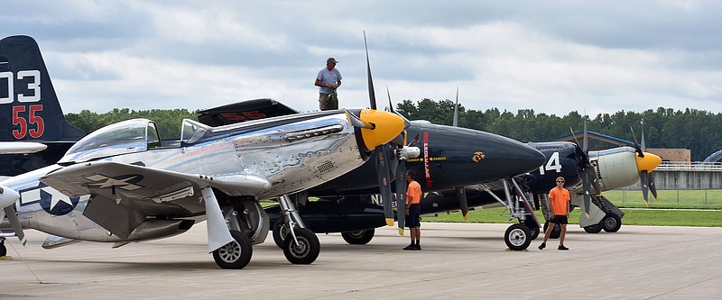 Four of the seven World War II warbirds -- a P-51D, F7F Tigercat, F8F Bearcat and a Hawker Sea Fury -- are seen stopping briefly at the Jefferson City Memorial Airport after participating in the Experimental Aircraft Association's AirVenture 2022 in Oshkosh, Wisconsin. (Shaun Zimmerman/News Tribune photo)