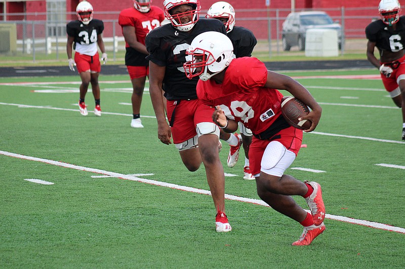 Talented group of running backs pushing each other in Cardinals camp