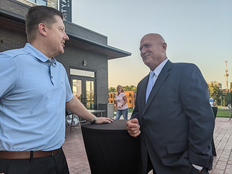 Sen. Mike Bernskoetter talked with Brandon Ruediger, his nephew in law, at his campaign watch party Tuesday evening at the Courtyard by Marriott hotel in Jefferson City. Bernskoetter hosted the watch party in conjunction with Rep. Rudy Veit. (Ryan Pivoney/News Tribune photo)