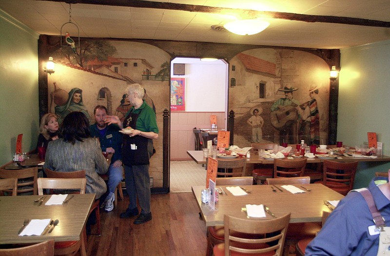 Kid-friendly and casual Browning’s Mexican Food at 5805 Kavanaugh Blvd. in Little Rock was not known for "romantic ambience" in 2003, despite murals and the dim lighting in the back dining room. (Democrat-Gazette file photo)