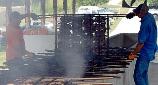 Chicken flippers provide valuable service at Decatur Barbecue ...