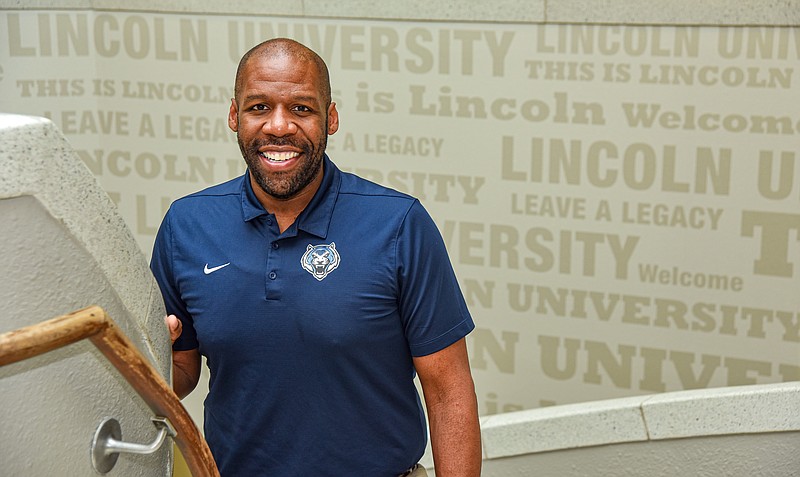 Jeremy Faulk poses on the stairwell in Young Hall Thursday, Aug. 4, 2022. Faulk was named chief of staff to Lincoln University President John Moseley. (Julie Smith/News Tribune photo)