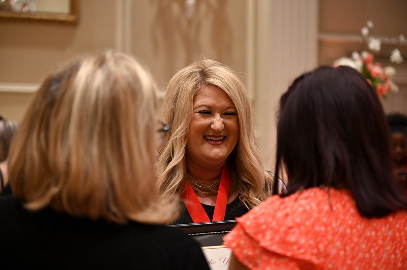 Stephanie Long, from Walter Turnbow Elementary School in Springdale, celebrates Thursday after being named one of four finalists during the Arkansas Teacher of the Year Regional Finalists ceremony at the Governor's mansion in Little Rock.
(Arkansas Democrat-Gazette/Stephen Swofford)