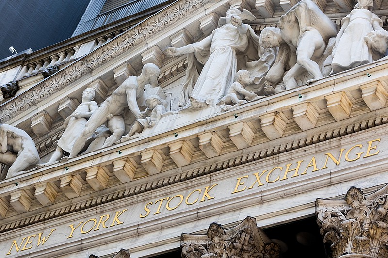 A detail of the exterior of The New York Stock Exchange, on Wednesday, Aug. 3, 2022, in New York. Stocks are opening nearly flat on Wall Street Thursday, Aug. 4. New data from the Labor Department showed more Americans applied for jobless benefits last week as the number of unemployed continues to rise modestly.(AP Photo/Julia Nikhinson)