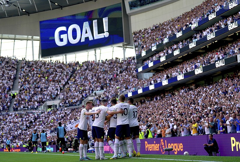 Tottenham Hotspur's Eric Dier celebrates with his teammates after scoring their side's second goal of the game , during the English Premier League soccer match betten Tottenham Hotspur and Southampton at Tottenham Hotspur Stadium, London, Saturday Aug. 6, 2022. (Kirsty O'Connor/PA via AP)