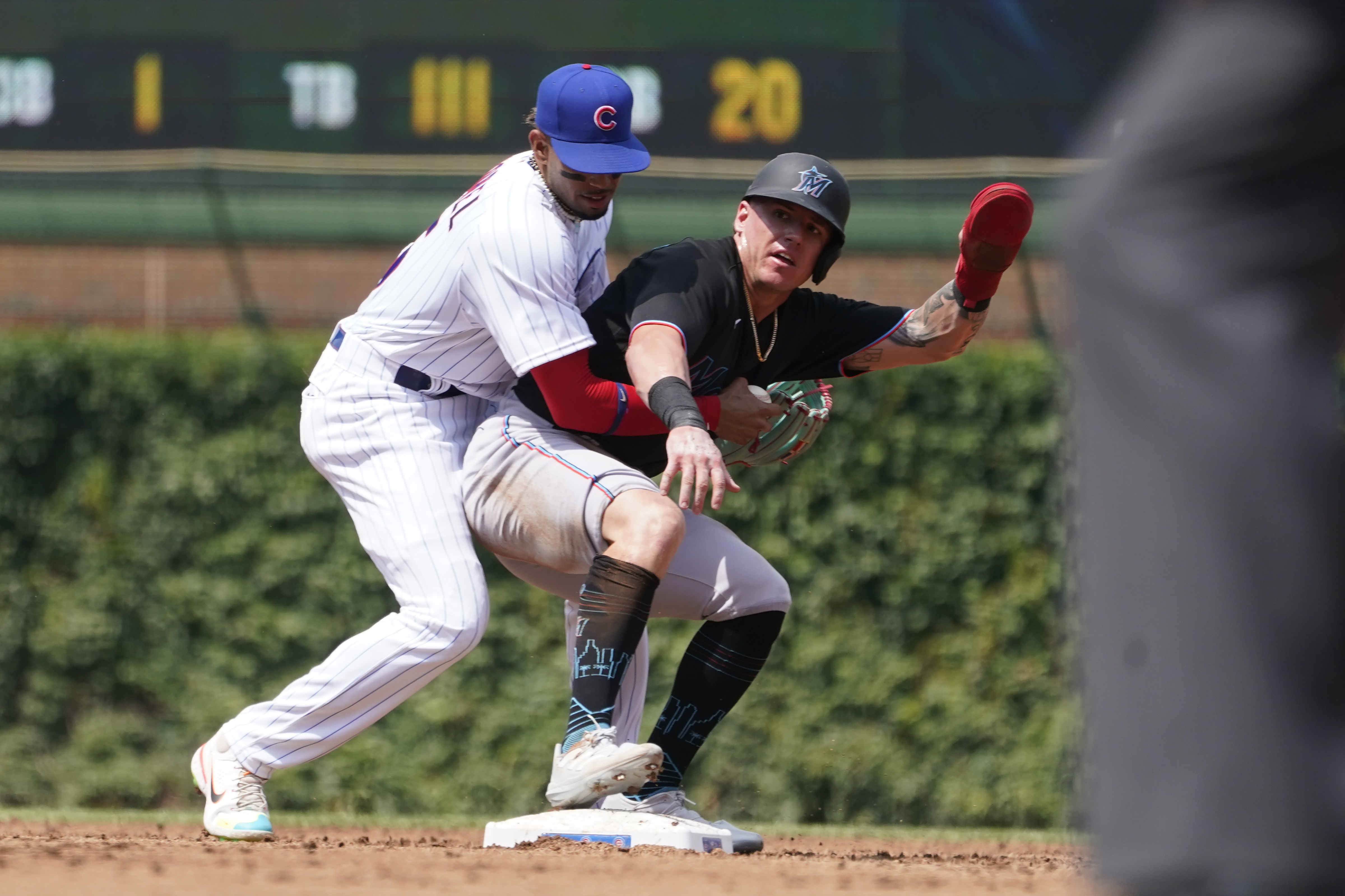 Miami Marlins' Peyton Burdick (6) celebrates his home run with