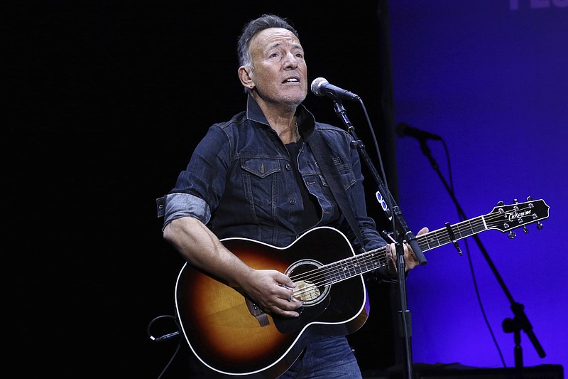 Bruce Springsteen performs at the 13th annual Stand Up For Heroes benefit concert in New York in a 2019 photo. Springsteen’s “Lucky Town” album is sad, but only when viewed in the context of how it was received upon release. Some Springsteen fans complained it was “too happy.” (Invision/AP file/Greg Allen)