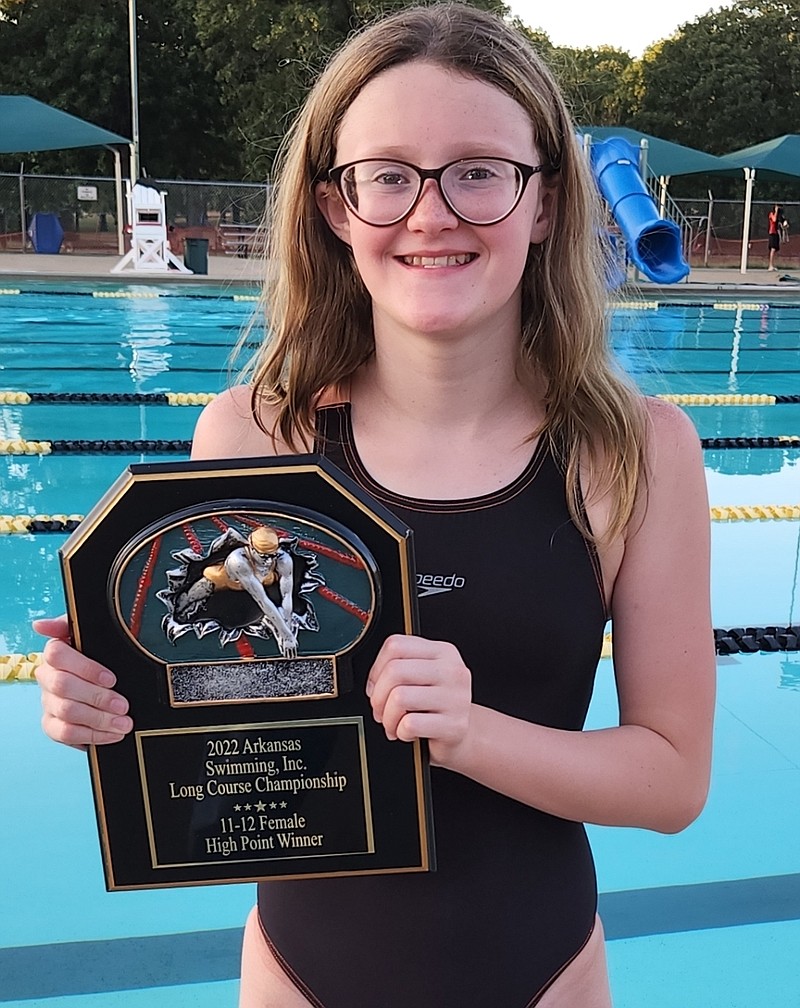 Lake Hamilton seventh grade swimmer Aubrey Schmitt celebrates winning the High Point award at the 2022 USA-Arkansas Long Course Championships in Forth Smith. - Submitted photo