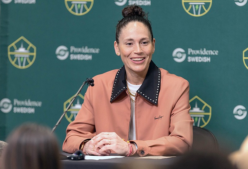 Sue Bird talks to reporters during a news conference, Sunday, Aug. 7, 2022 at Climate Pledge Arena in Seattle. The largest crowd in Storm history packed Climate Pledge Arena to thank Bird for her two decades as the face of the franchise and one of the best women’s basketball players ever. (Dean Rutz/The Seattle Times via AP)