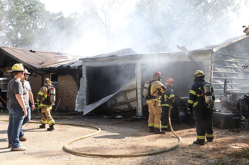 LYNN KUTTER ENTERPRISE-LEADER
Farmington Fire Department and many other agencies responded to a structure fire on Bethel Blacktop on Aug. 3. A next door neighbor said he heard an explosion and saw flames coming from the garage. No one was injured in the fire.