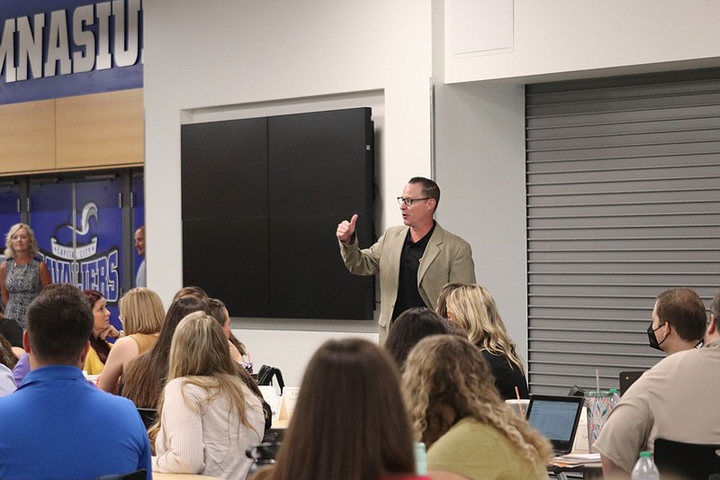 Superintendent Bryan McGraw greets a room full of new teachers Monday, Aug. 8, 2022, at the Capital City High School cafeteria in Jefferson City. (Anna Campbell/News Tribune photo)