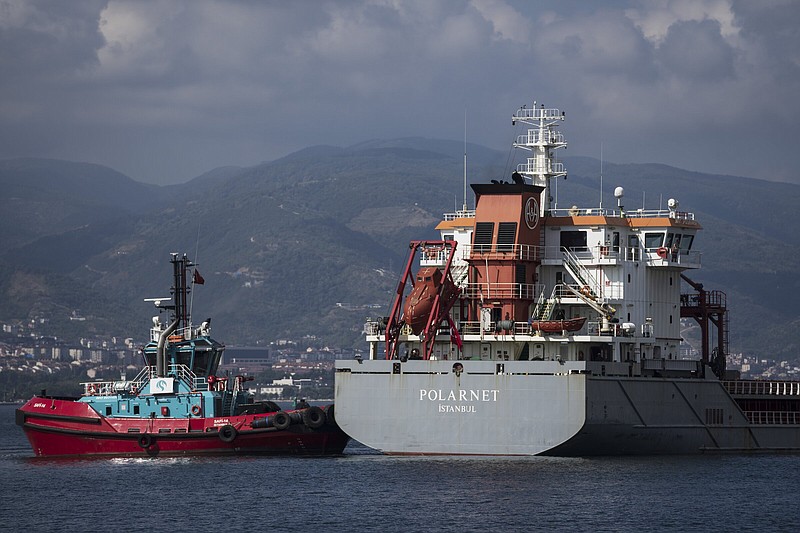 The cargo ship Polarnet arrives to Derince port in the Gulf of Izmit, Turkey, Monday Aug. 8, 2022. The Polarnet is the first Ukrainian grain shipment to arrive at its destination in Turkey under a deal to unblock grain supplies amid the threat of a global food crisis. (AP Photo/Khalil Hamra)