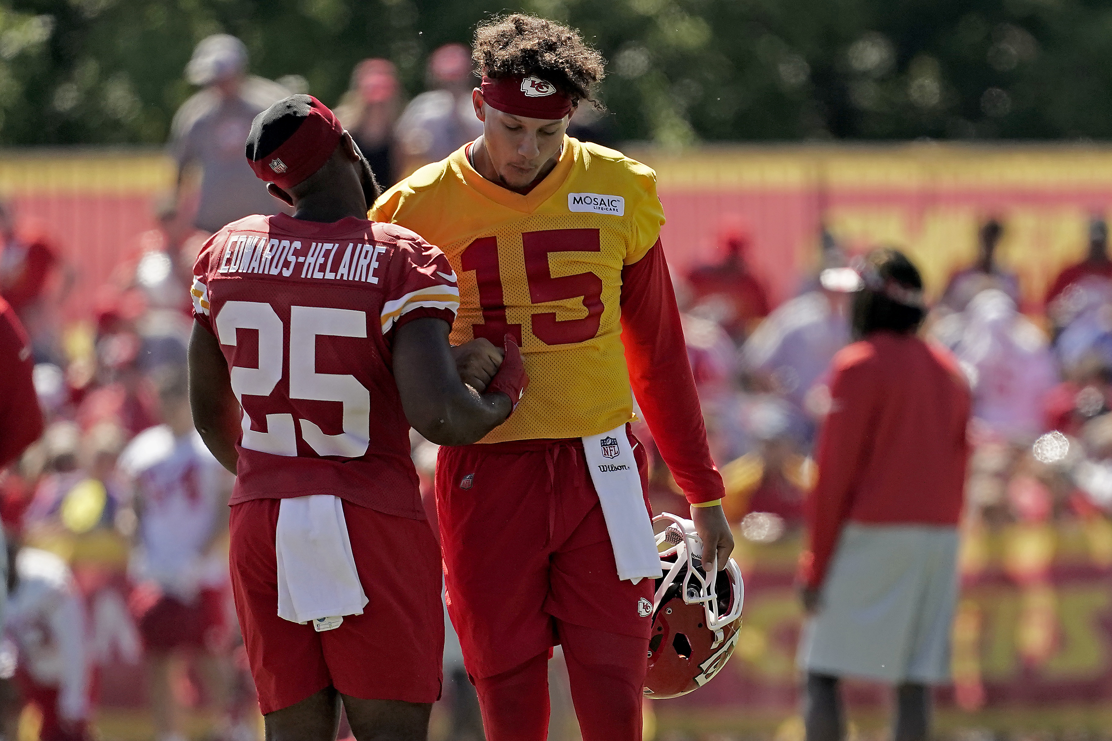 Kansas City Chiefs quarterback Patrick Mahomes (15) warms up during NFL  football training camp …