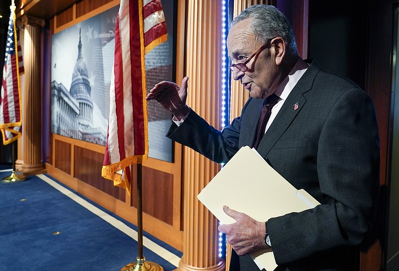 FILE - Senate Majority Leader Chuck Schumer of N.Y., answers one final question before leaving after a news conference, Aug. 5, 2022, at the Capitol Hill in Washington. Schumer effectively became the leader of the U.S. Senate on the morning of the Jan. 6, 2021 Capitol insurrection. And it has been mess and tumultuous ever since. Yet the New York Democrat has led the Senate in a surprisingly productive run, despite the longest evenly split 50-50 Senate in U.S. history. (AP Photo/Mariam Zuhaib, File)