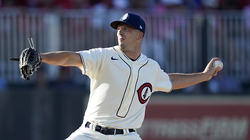 Chicago Cubs pitcher Drew Smyly throws against the Cincinnati Reds in the first inning of a baseball game at the Field of Dreams movie site, Thursday, Aug. 11, 2022, in Dyersville, Iowa. (AP Photo/Charlie Neibergall)
