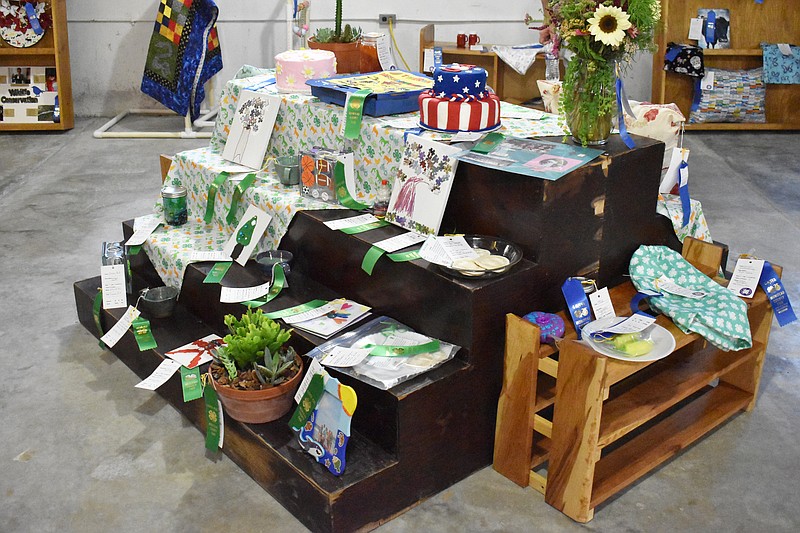 Democrat photo/Garrett Fuller
Projects from area 4-H and FFA members are displayed Aug. 1 in the lower level of Centennial Hall at the Moniteau County Fair in California.