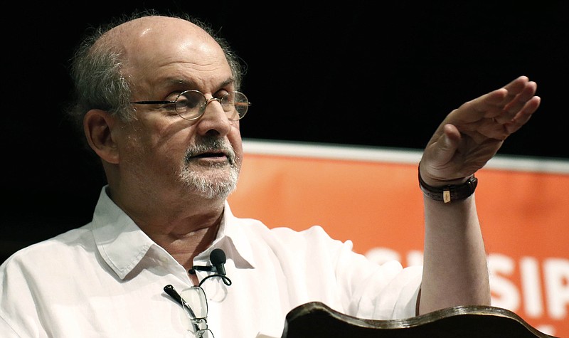 FILE &#x2014; Author Salman Rushdie talks about the start of his writing career, during the Mississippi Book Festival, in Jackson, Miss., on Aug. 18, 2018. Rushdie, the author whose writing led to death threats from Iran in the 1980s, was attacked Friday while giving a lecture in western New York. (AP Photo/Rogelio V. Solis, File)