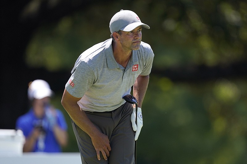 Adam Scott, of Australia, watches his shot off the sixth tee during the third round of the St. Jude Championship golf tournament, Saturday, Aug. 13, 2022, in Memphis, Tenn. (AP Photo/Mark Humphrey