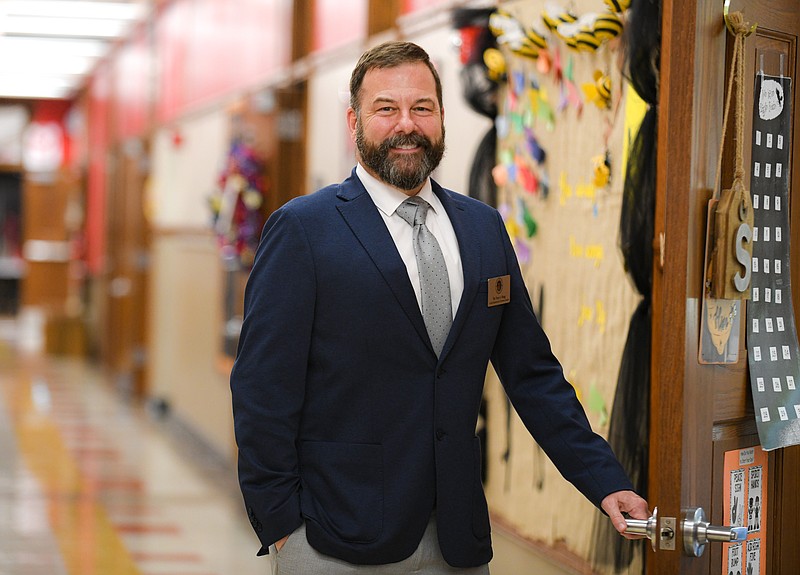 Troy Hogg stands in the hallway at East School. Hogg has accepted the position of assistant elementary superintendent in the Jefferson City Public School District and was at the school for meetings with staff and administrators before the start of the 2022-23 school year. (Julie Smith/News Tribune photo)