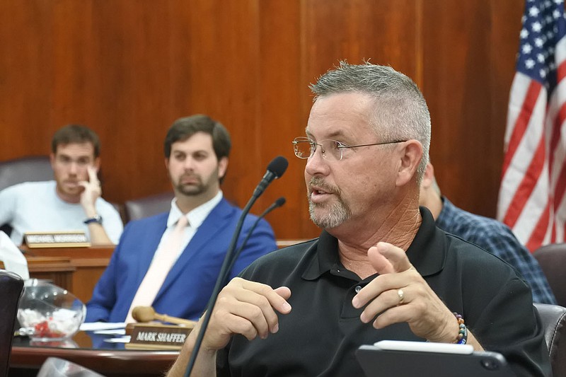 Roger Atwell, justice of the peace for Crawford County’s District 13 and chairman of county Personnel Committee, asks a question during the committee’s meeting Monday.

(NWA Democrat-Gazette/Thomas Saccente)