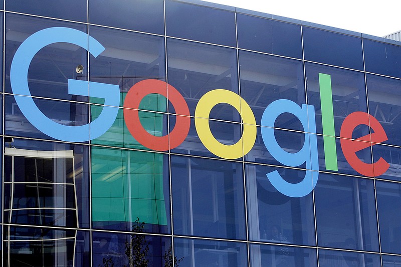 A sign is shown on a Google building at their campus in Mountain View, Calif., on Sept. 24, 2019. Hundreds of Google employees are petitioning the company to extend its abortion healthcare benefits to contract workers and to strengthen privacy protections for Google users searching for abortion information online. (AP Photo/Jeff Chiu, File)
