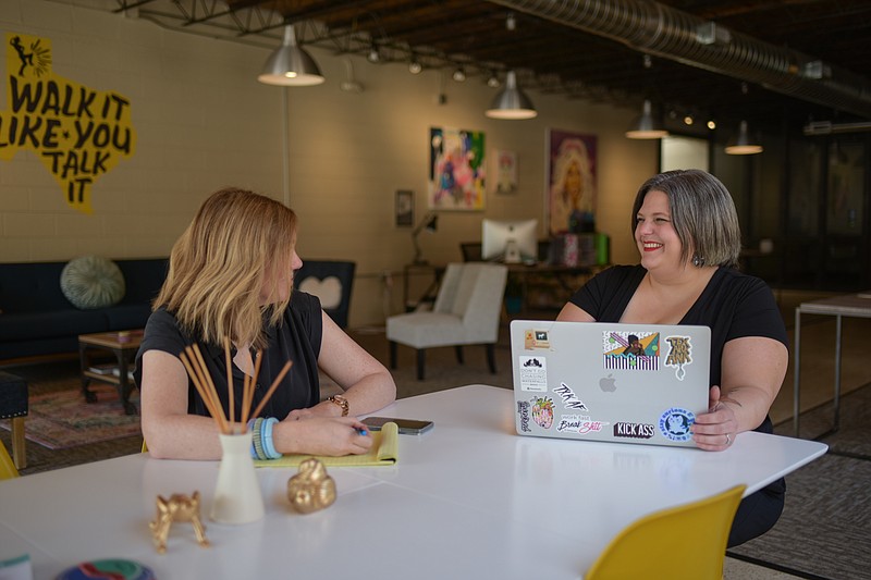 Owners of For All Brand Kind hold a work meeting on Friday, August 12, 2022, in their Fab/co shared workspace at 3307 Texas Blvd., in Texarkana, Texas. (Staff photo by Erin DeBlanc)