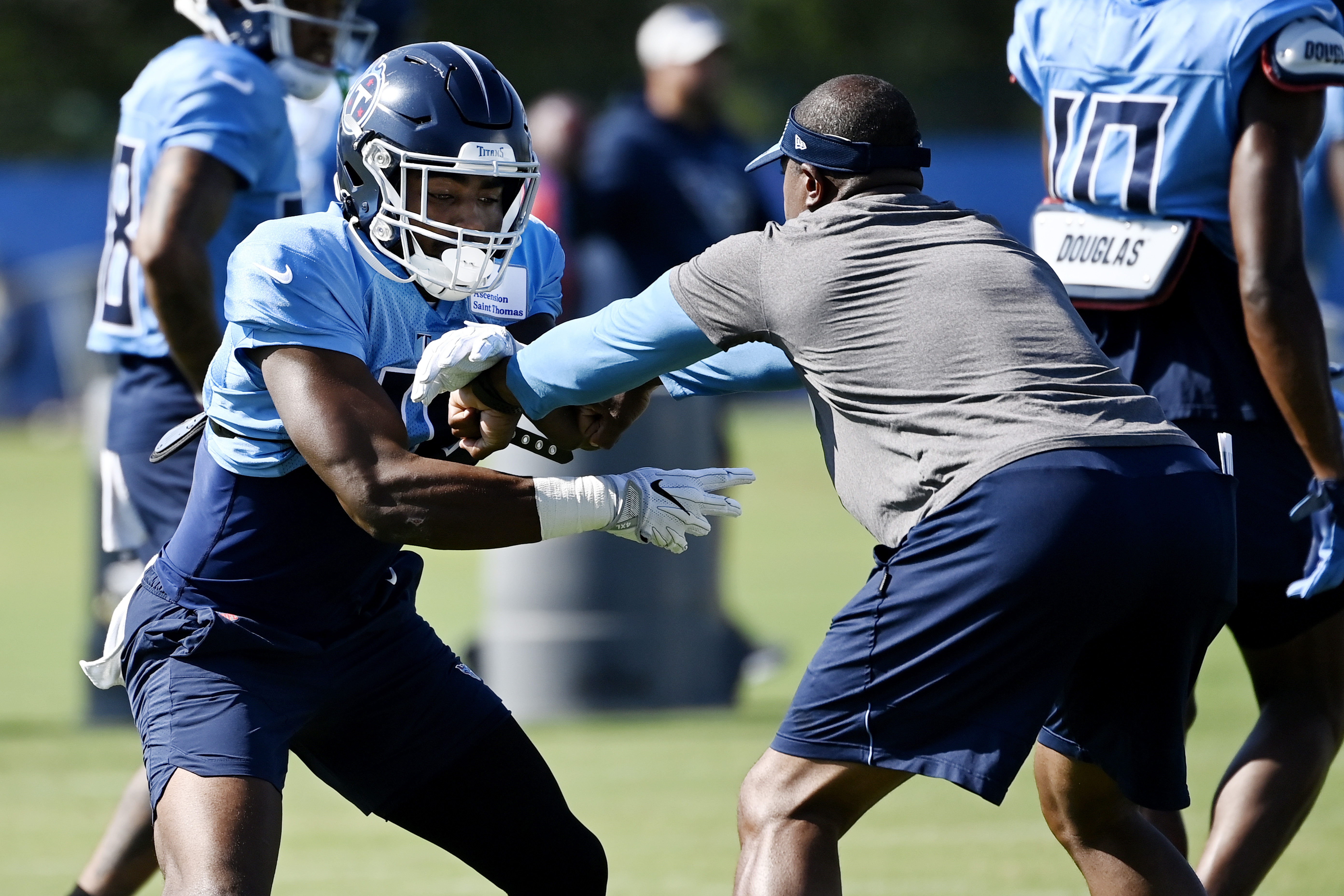 Tennessee Titans wide receiver Treylon Burks runs with the ball