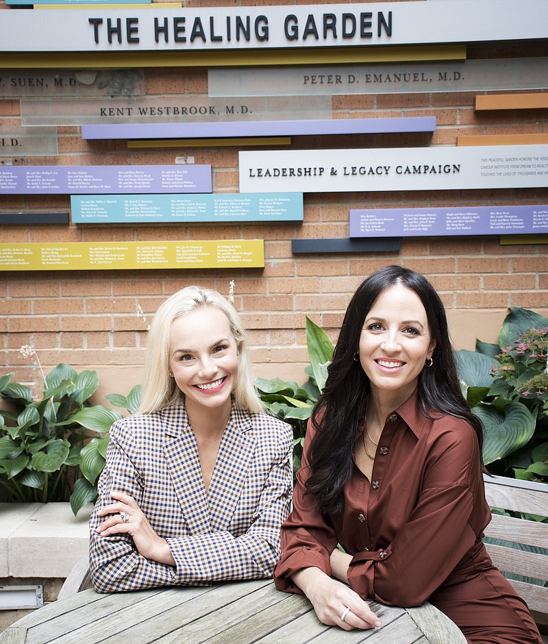 Rachel Harding (left) and Annemarie Jazic, co-chairs of this year's  Gala for Life fundraiser, visit the Heaing Garden at UAMS' Winthrop P. Rockefeller Cancer Institute.
 (Arkansas Democrat-Gazette/Cary Jenkins)