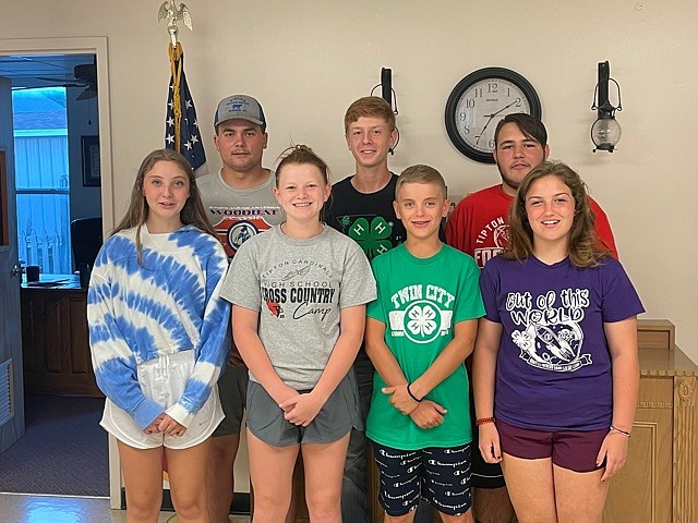 Moniteau County 4-H members prepares for their Day of Service project, "Honoring Local Heroes." The event will take place at the Latham Memorial Family Park on Sept. 11, 2022, and will recognize the services of active military, veterans, police officers, emergency personnel and more. (Democrat photo/Kaden Quinn)

Pictured from the left to right are seven of the 15 members. (Top) Hunter Berendzen, Brayden Hallford, Grant Pardoe, (bottom)Isabelle Allen, Raylyn Wilfong, Caleb Howard and Sonya Grotjan.
