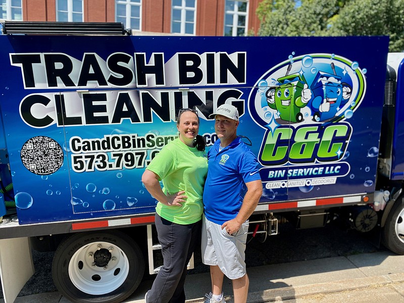 C and C Bin Service owners Jessica and Corey Braun pose with their new trash bin cleaning truck on Thursday, Aug. 25, 2022. (Cameron Gerber/News Tribune photo)