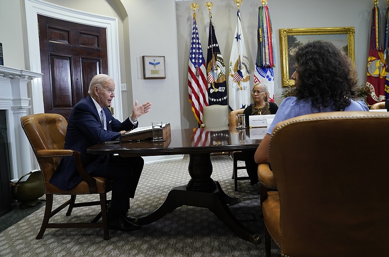 President Joe Biden speaks during a meeting with state and local elected officials about reproductive health care, in the Roosevelt Room of the White House, Friday, Aug. 26, 2022, in Washington. Mayor Elaine O’Neal of Durham, N.C., second from right, and County Judge Lina Hidalgo of Harris County, Texas, right, listen. (AP Photo/Evan Vucci)