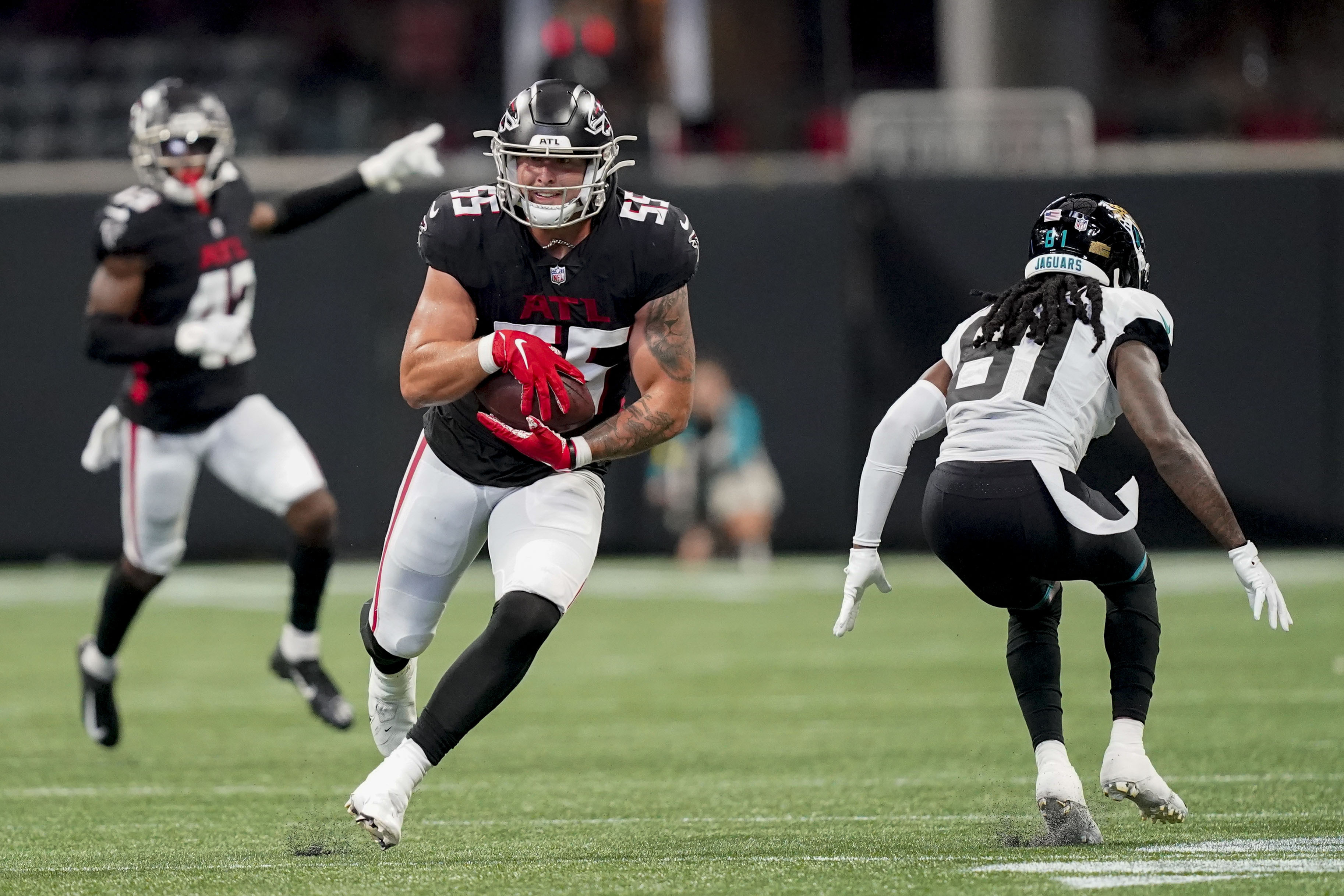 Atlanta Falcons cornerback Teez Tabor (20) runs onto the field before an  NFL football game against the Jacksonville Jaguars, Saturday, Aug. 27,  2022, in Atlanta. The Atlanta Falcons won 28-12. (AP Photo/Danny