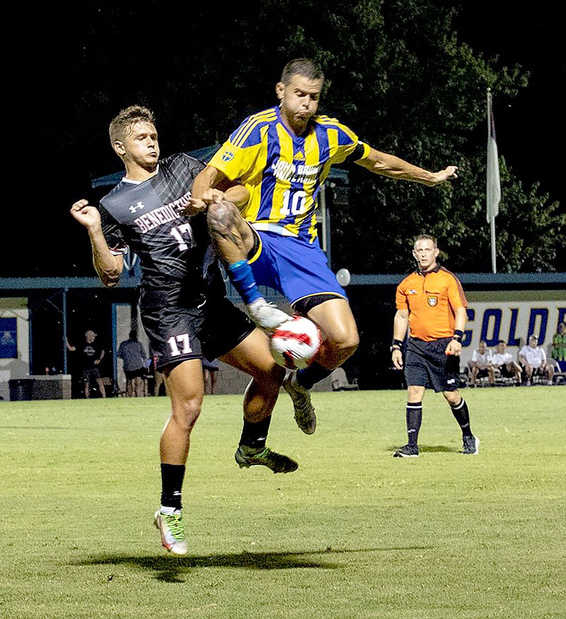 Photo courtesy of JBU Sports Information
John Brown's Oscar Carballo (right) battles Benedictine's Carson Wilcox for the ball during the two teams' match on Friday, Aug. 26, at Alumni Field. The Ravens and Golden Eagles played to a 2-2 draw.