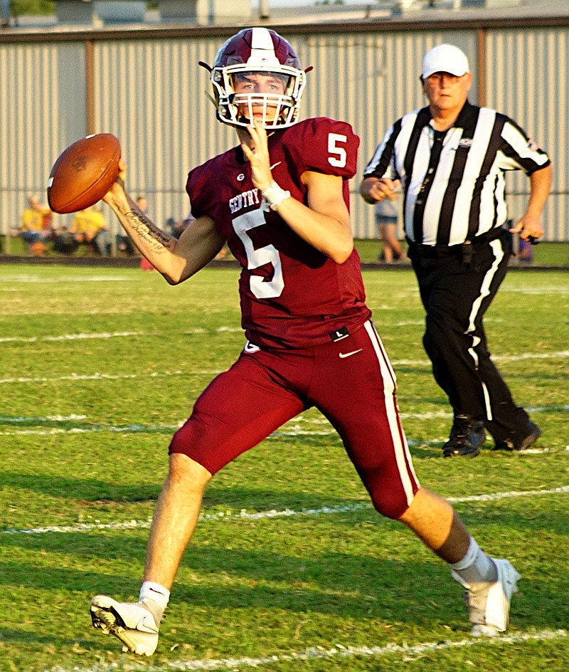 Westside Eagle Observer/RANDY MOLL
Gentry senior Chris Bell looks for an open receiver during the Friday night contest against the visiting Yellowjackets from Westville, Okla.