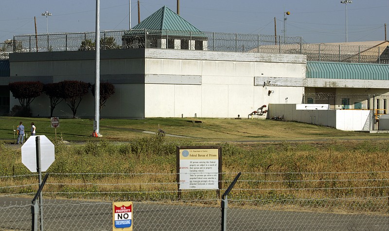 The Federal Correctional Institution is shown July 20, 2006, in Dublin, Calif., July 20, 2006. Former California prison chaplain who pleaded guilty to forcing an inmate to have sex with him is facing sentencing in a federal court. James Theodore Highhouse is alleged to have abused several women at the Federal Correctional Institution in Dublin, California. (AP Photo/Ben Margot, File)