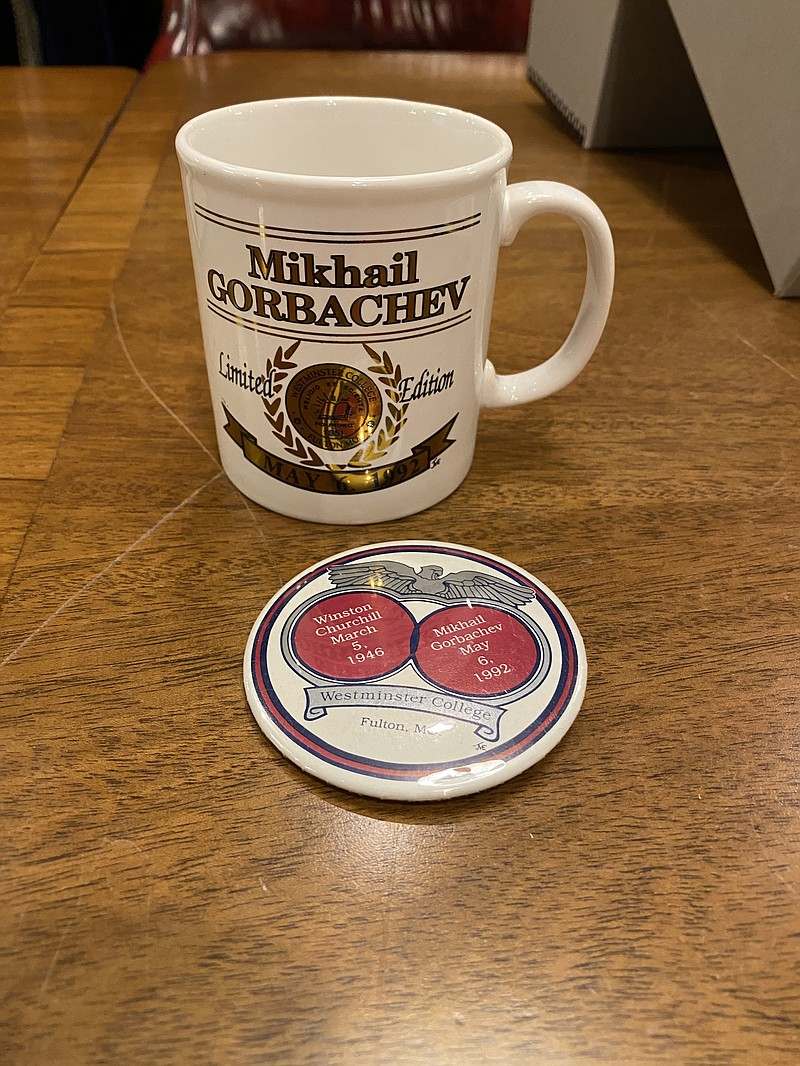 A mug and button that commemorated Mikhail Gorbachev's speech at Westminster College, which occurred 46 years after Winston Churchill spoke at the college.