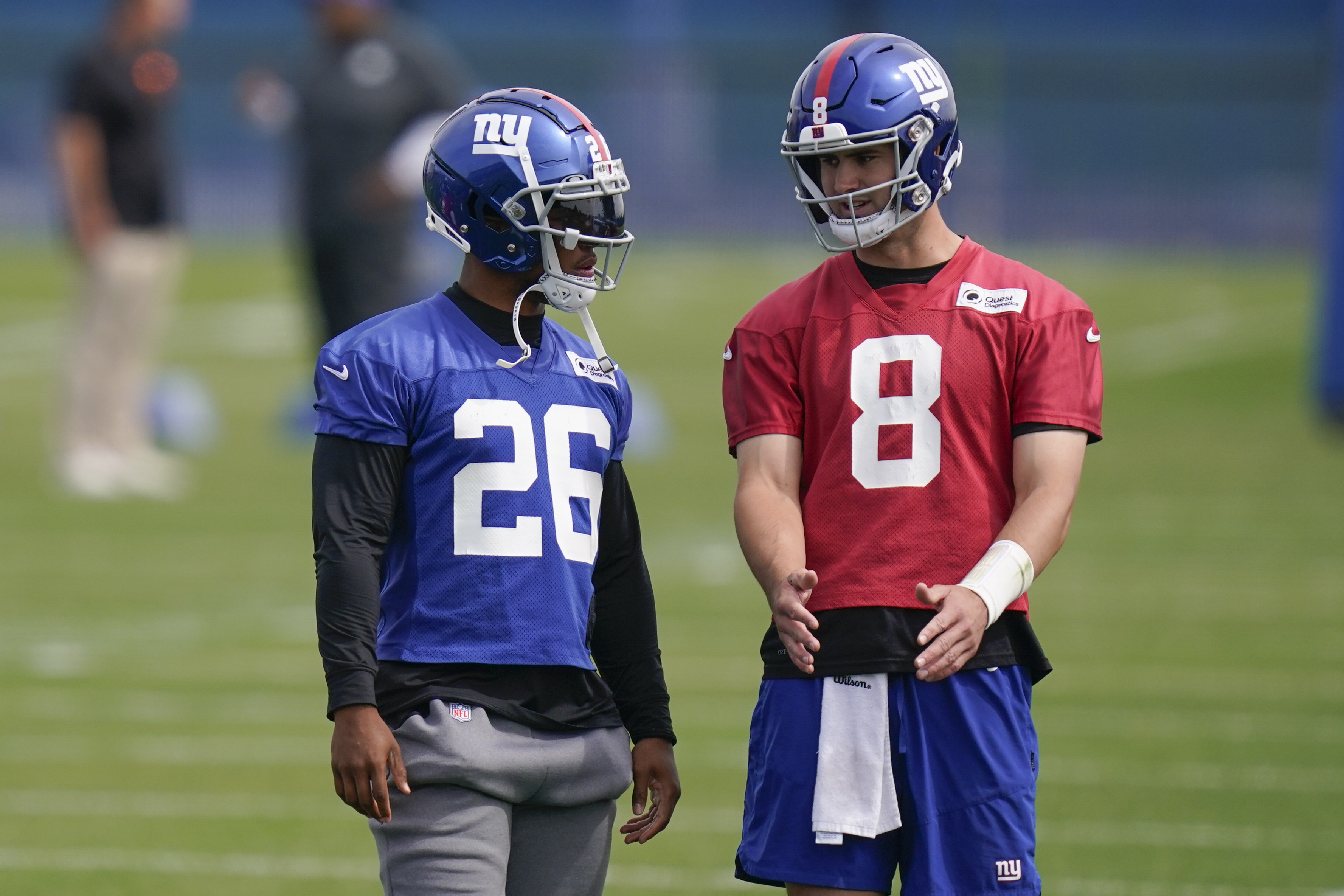 FILE - New York Giants running back Saquon Barkley (26) participates in  training camp at the NFL football team's practice facility, Friday, July  29, 2022, in East Rutherford, N.J. With the New