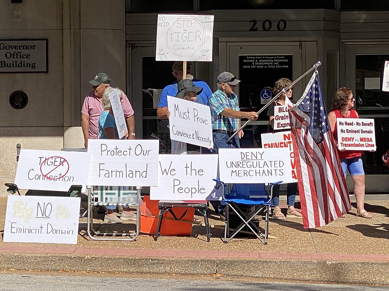 Anakin Bush/Fulton Sun
Protesters hold signs outside the Missouri Public Service Commission building in Jefferson City.