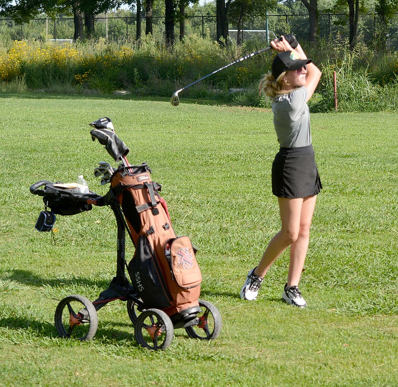 Graham Thomas/Herald-Leader
Siloam Springs senior Baylee Morris takes a swing on hole No. 9 at The Course at Sager's Crossing during a nine-hole match against Bentonville and Van Buren on Wednesday, Aug. 31.