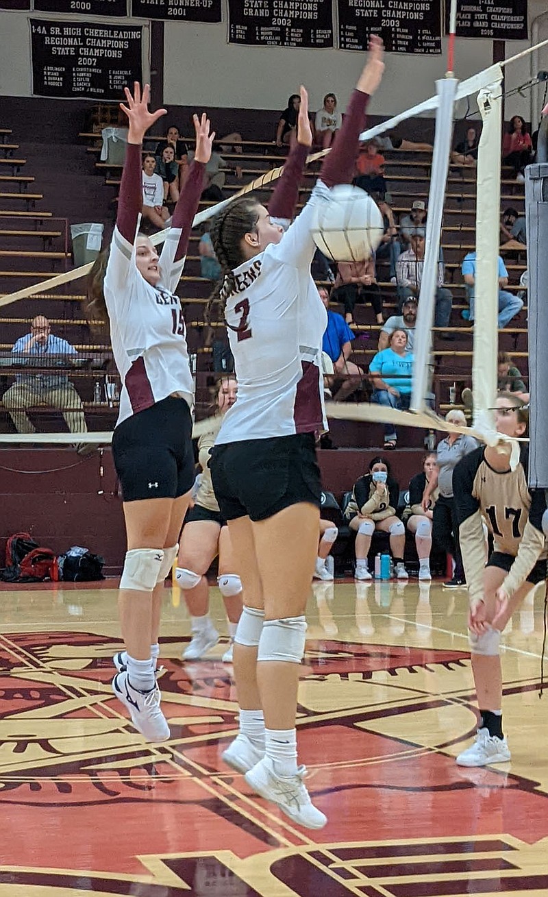 Westside Eagle Observer/RANDY MOLL
Gentry juniors Abigail Schopper (No. 15) and Reese Hester (No. 2) go up to block a shot during play against West Fork in Gentry on Aug. 29.
