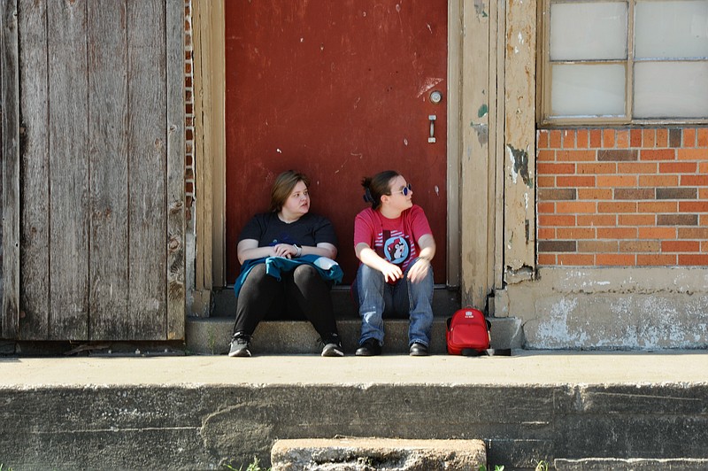 Lance Glover (left) and Zoe Slaughter watch for the Mokane World's Fair parade Saturday, Sept. 3, 2022. Both said they look forward to watching and hearing the South Callaway High School band.