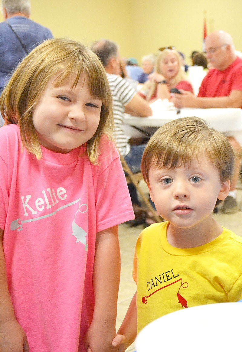 TIMES photographs by Annette Beard
Kellie Ash, 6, and Daniel Ash, 2, children of Adam and Leann Ash of Gateway enjoyed the annual NEBCO Labor Day breakfast in Garfield with their family Monday morning. Members of the Northeast Benton County Volunteer Fire Department and the board of directors prepared and served pancakes, bacon, biscuits and much more. For more photographs, go to the PRT gallery at https://tnebc.nwaonline.com/photos/.