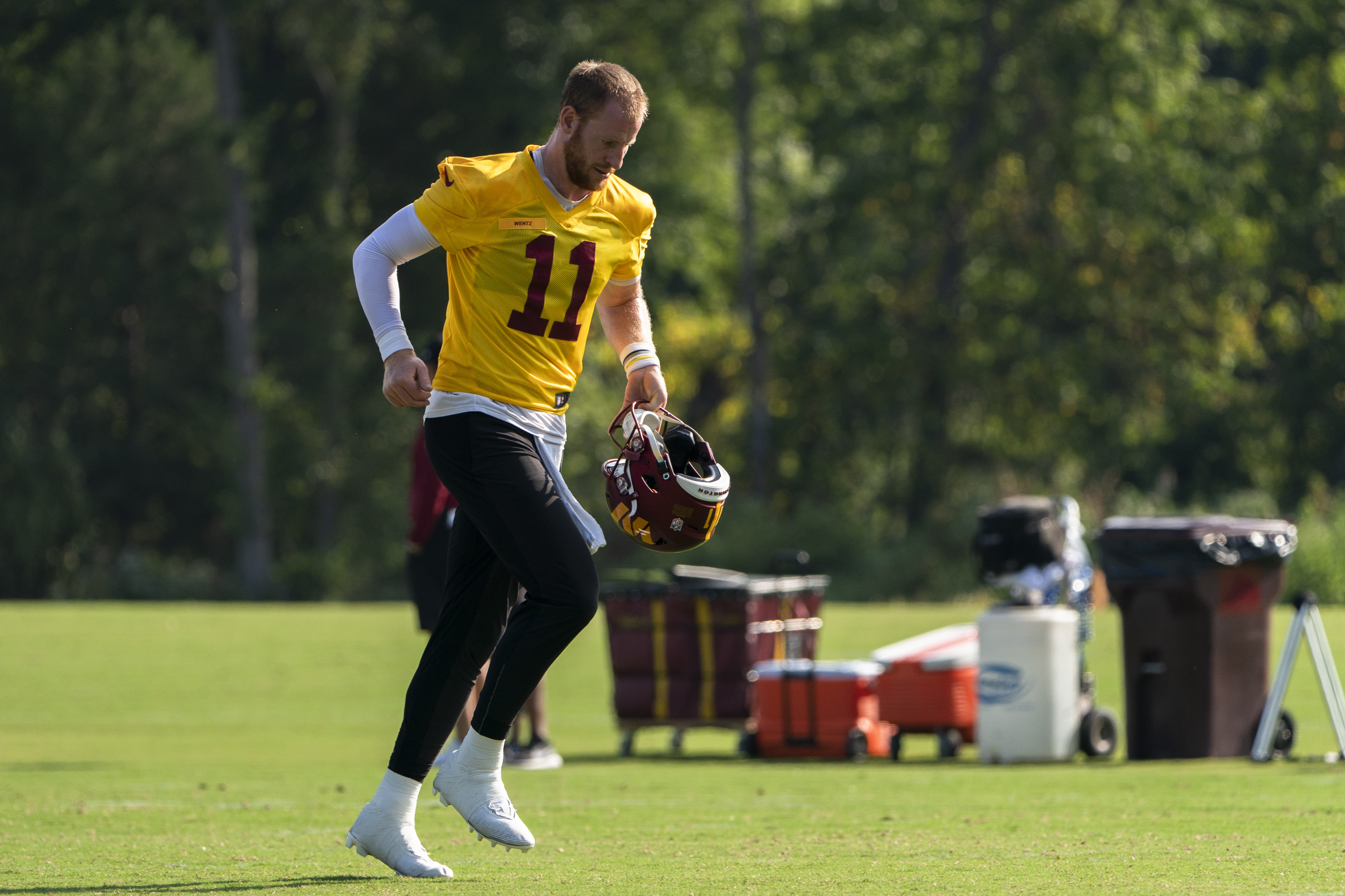 Wentz returns to Commanders practice, not as starting QB