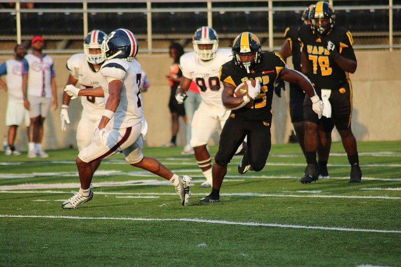 UAPB running back Kayvon Britten finds running room against Lane College on Saturday at Simmons Bank Field at Golden Lion Stadium. (Special to The Commercial/Jamie Hooks)