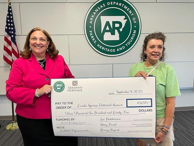 The Eureka Springs Historical Museum has been awarded a $3,695 grant from the Division of Arkansas Heritage. Pictured are Debra Fithen (left) from the Division of Arkansas Heritage and ESHM board member Ruth Hager. This funding will enable the museum to update its printed permanent exhibition display graphics and historical text to a larger format.

(Courtesy Photo)