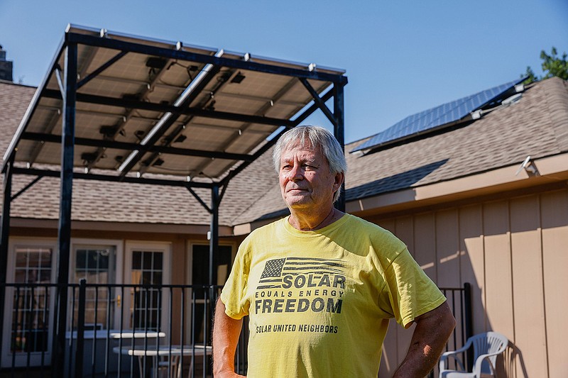 Larry Howe, co-founder of Plano Solar Advocates, installed solar panels on his roof and over his backyard porch. He said the panels provide about 60% of his yearly electricity. (Lola Gomez/Dallas Morning News/TNS)
