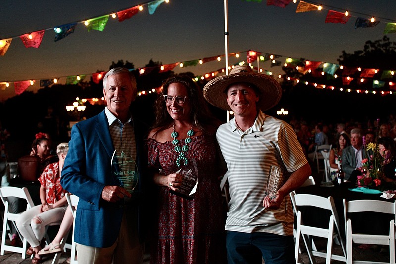 Kevin Riley, Angela Nale and Matt Green pose with their awards during the Jefferson City Area Chamber of Commerce's gala on Friday, Sept. 9 at Canterbury Hill Winery. (News Tribune/Cameron Gerber)