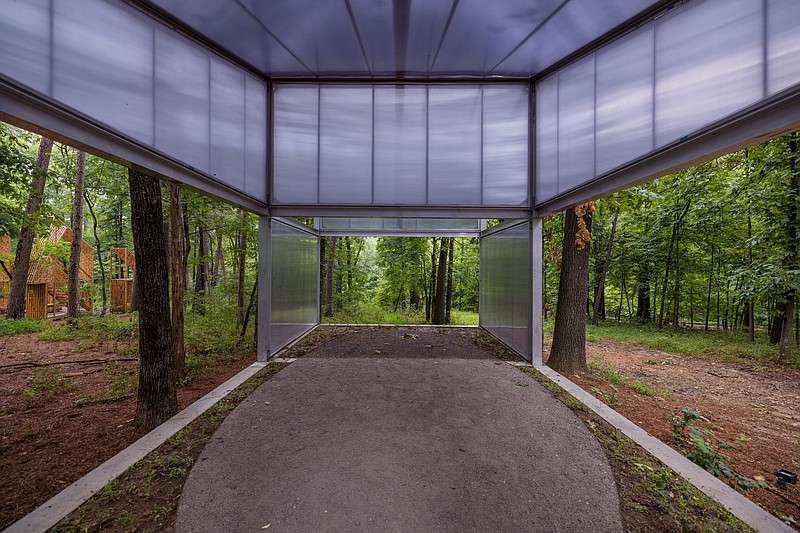 “Infinite Openness,” a structure designed by Pablo Perez of Mexico City-based Perez Palacios Arquitectos Asociados (PPAA) awaits visitors to the “Architecture at Home” exhibition now open at Crystal Bridges Museum of American Art in Bentonville. The outdoor exhibition features five prototypes of imaginary houses, posited by five architectural firms from across North America … and, says curator Dylan Turk, is about “the important relationship between us as human beings and the spaces in which we live, and how communities can leverage these spaces to make our communities … work better as a place to live.” (Special to the Democrat-Gazette/Ironside Photography)